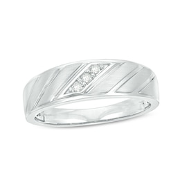 Previously Owned - Men's 1/20 CT. T.W. Diamond Three Stone Slant Groove Wedding Band in 10K White Gold